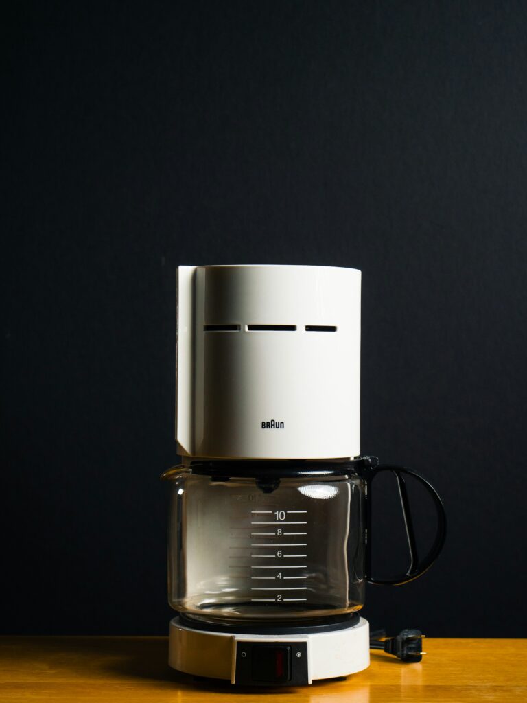 White Braun Coffee Maker Machine with black background
